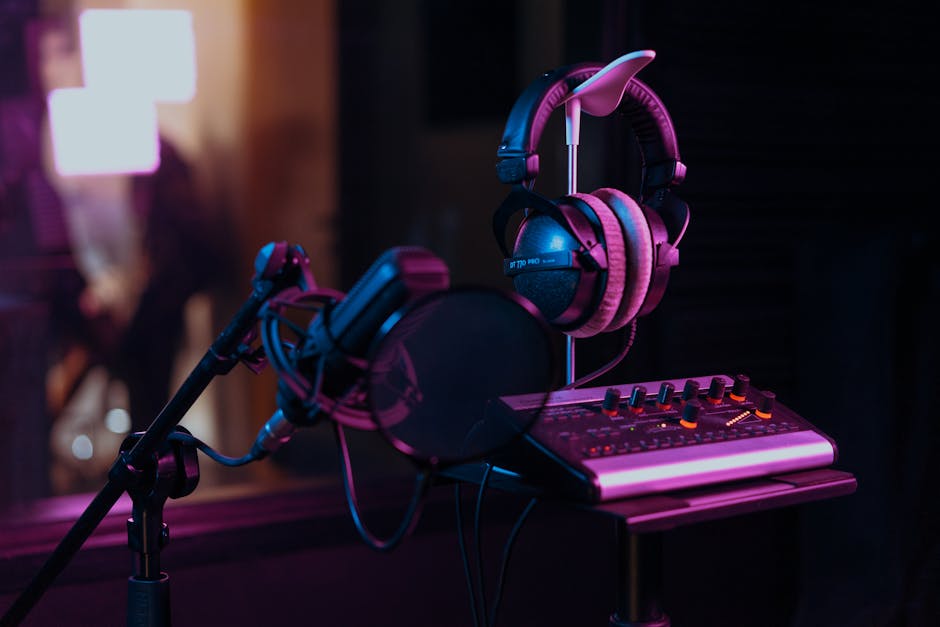 Musician home studio workspace with paperwork and tablet