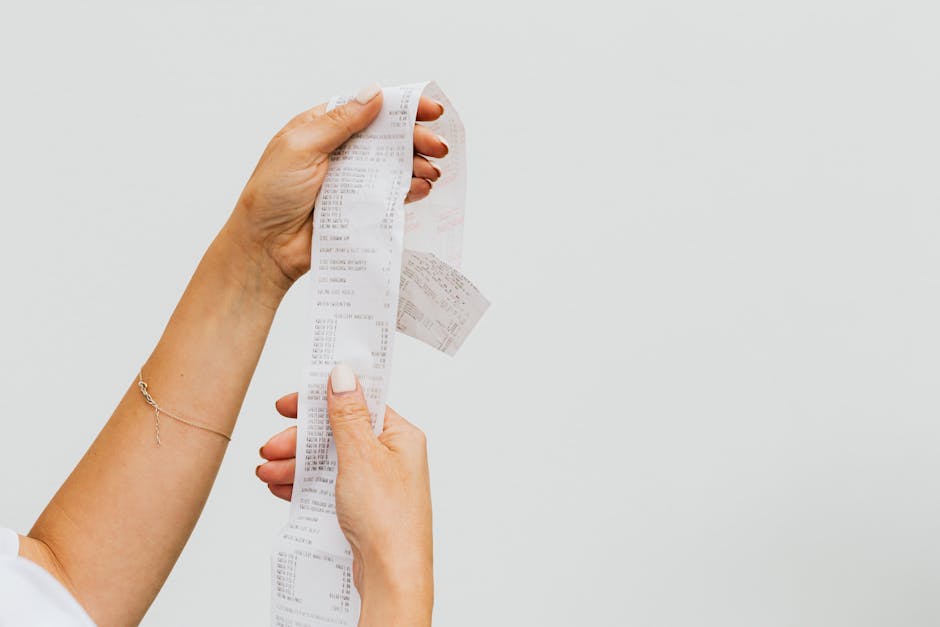 Receipt on desk with phone ready to scan